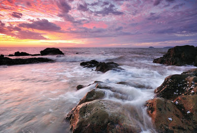 Scenic view of sea against sky during sunset