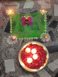 High angle view of red flowers in pot