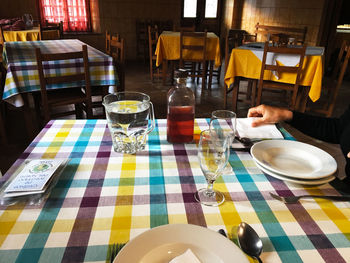 View of wine glasses on table in restaurant