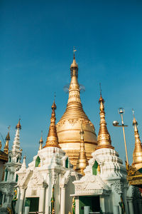 Low angle view of building against blue sky