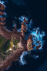 High angle view of rock formation in water