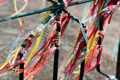 Colored ribbons of senhor do bonfim tied to an iron gate in pelourinho.