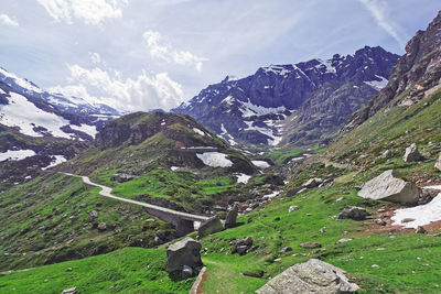 Scenic view of snowcapped mountains against sky