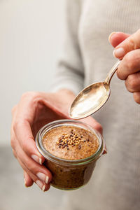 Close-up of woman holding drink