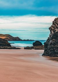 Scenic view of beach against sky