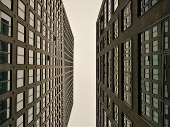 Between two skyscrapers in the financial heart of frankfurt on a rainy day.  feels a bit like ny.