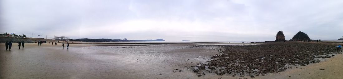 Panoramic view of beach against sky