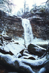 Frozen waterfall in forest