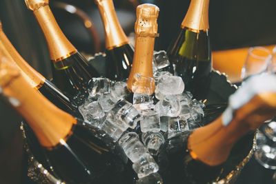 Bottle of champagnes in ice bucket