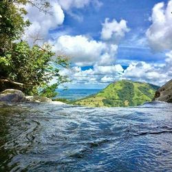 Scenic view of sea against blue sky