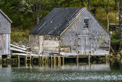 Exterior of old building by lake