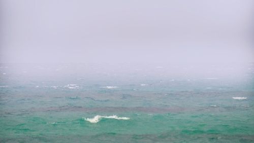 Scenic view of sea during foggy weather