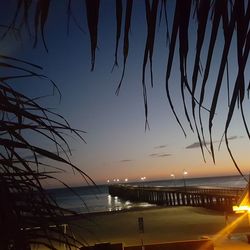 Scenic view of sea against sky at night