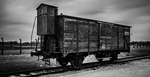 Train on railroad track against sky