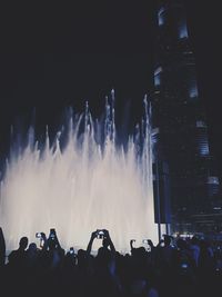 Panoramic view of crowd at music concert