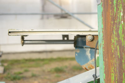 Close-up of old vintage car on land