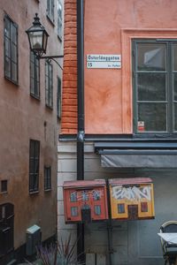 Information sign on building in city