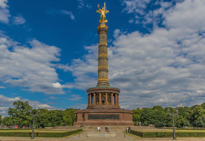 Low angle view of historical building against cloudy sky