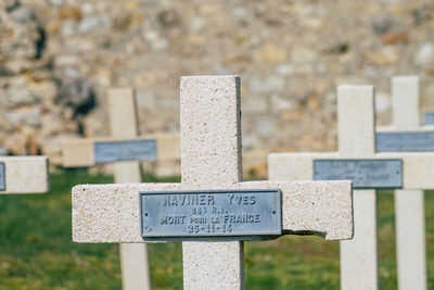 Close-up of cross in cemetery