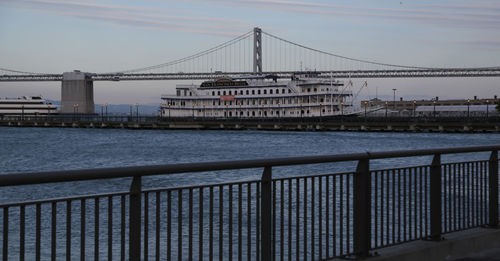 View of suspension bridge over sea