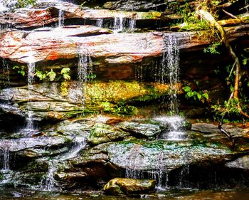 Close-up of water flowing over rocks