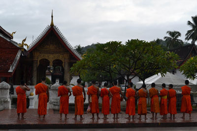 Group of people in temple against building