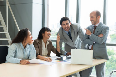 Business colleagues working at office