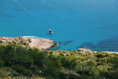 High angle view of sailboats by sea