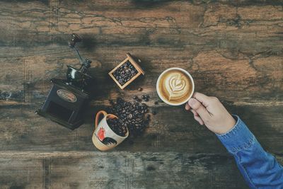 High angle view of coffee cup on table