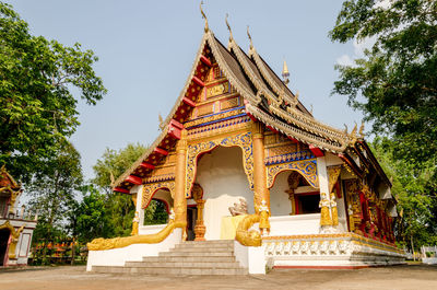 Low angle view of temple against building