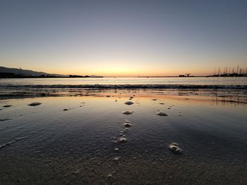 Scenic view of sea against sky during sunset