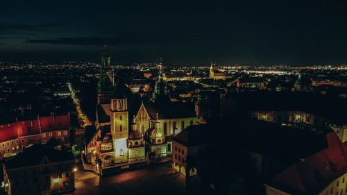 High angle view of city buildings at night