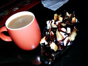 High angle view of coffee cup on table