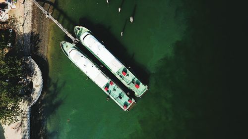 High angle view of boat moored in water