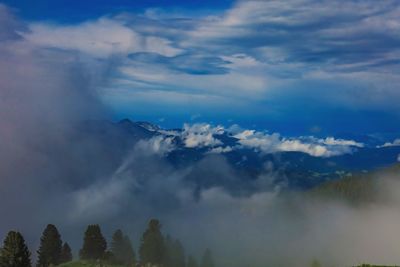 Low angle view of majestic mountains against sky