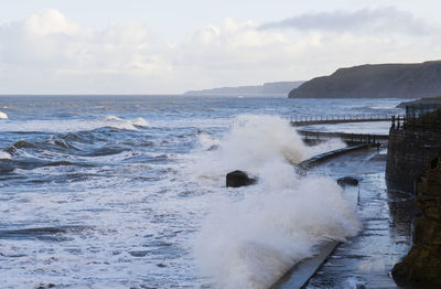 Heavy seas breaking over the foreshore at scarborough south bay
