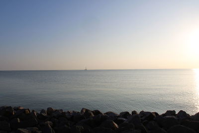 Scenic view of sea against clear sky during sunset