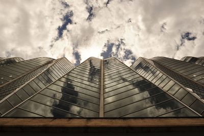 Low angle view of modern buildings against sky