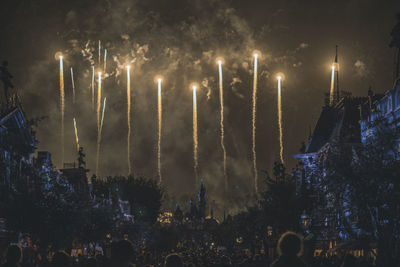 View of firework display at night