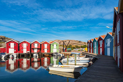 Boats moored at harbor