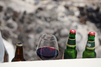 Close-up of wine bottles in glass bottle