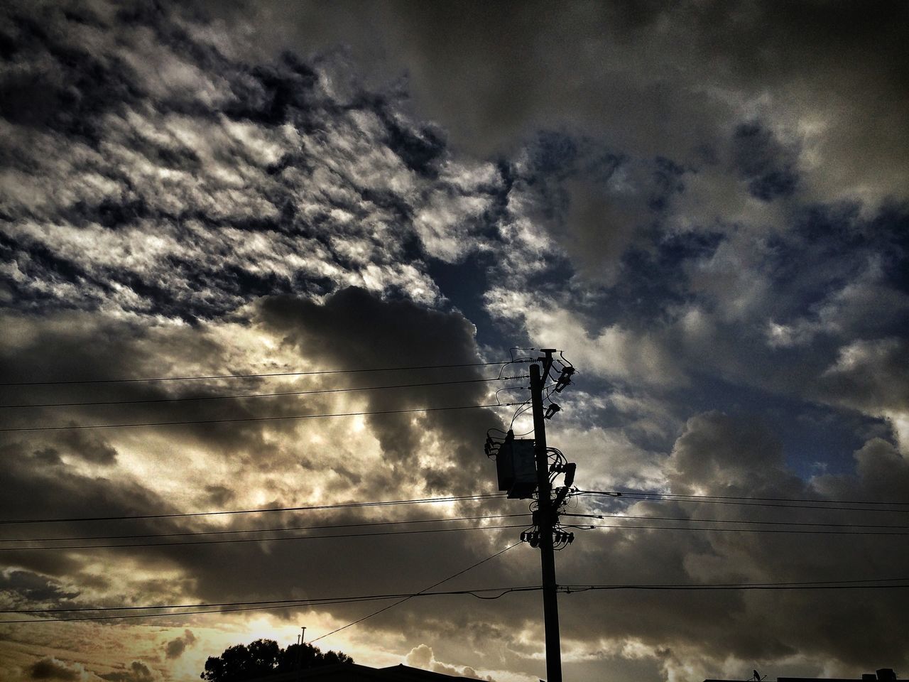 sky, cloud - sky, low angle view, cloudy, power line, technology, electricity, silhouette, weather, electricity pylon, fuel and power generation, power supply, cloud, cable, transportation, overhead cable car, overcast, nature, mode of transport, connection