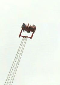 Low angle view of cables against clear sky