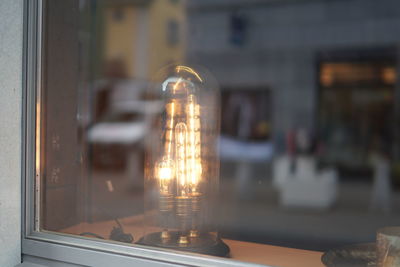 Close-up of illuminated light bulb