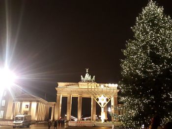 Low angle view of illuminated building at night