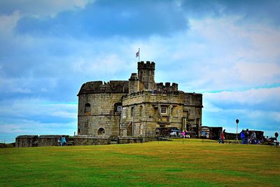 View of historical building against cloudy sky