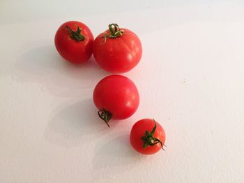 High angle view of cherry tomatoes on table