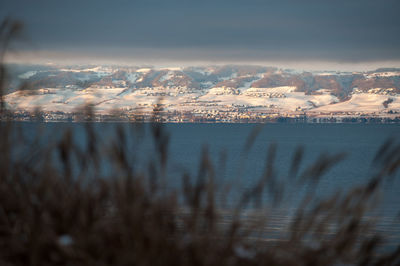 Aerial view of landscape against sky during winter