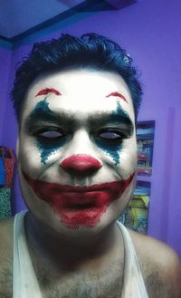 Close-up portrait of man with woman at home