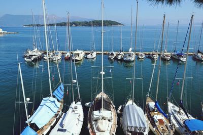 Boats moored at harbor